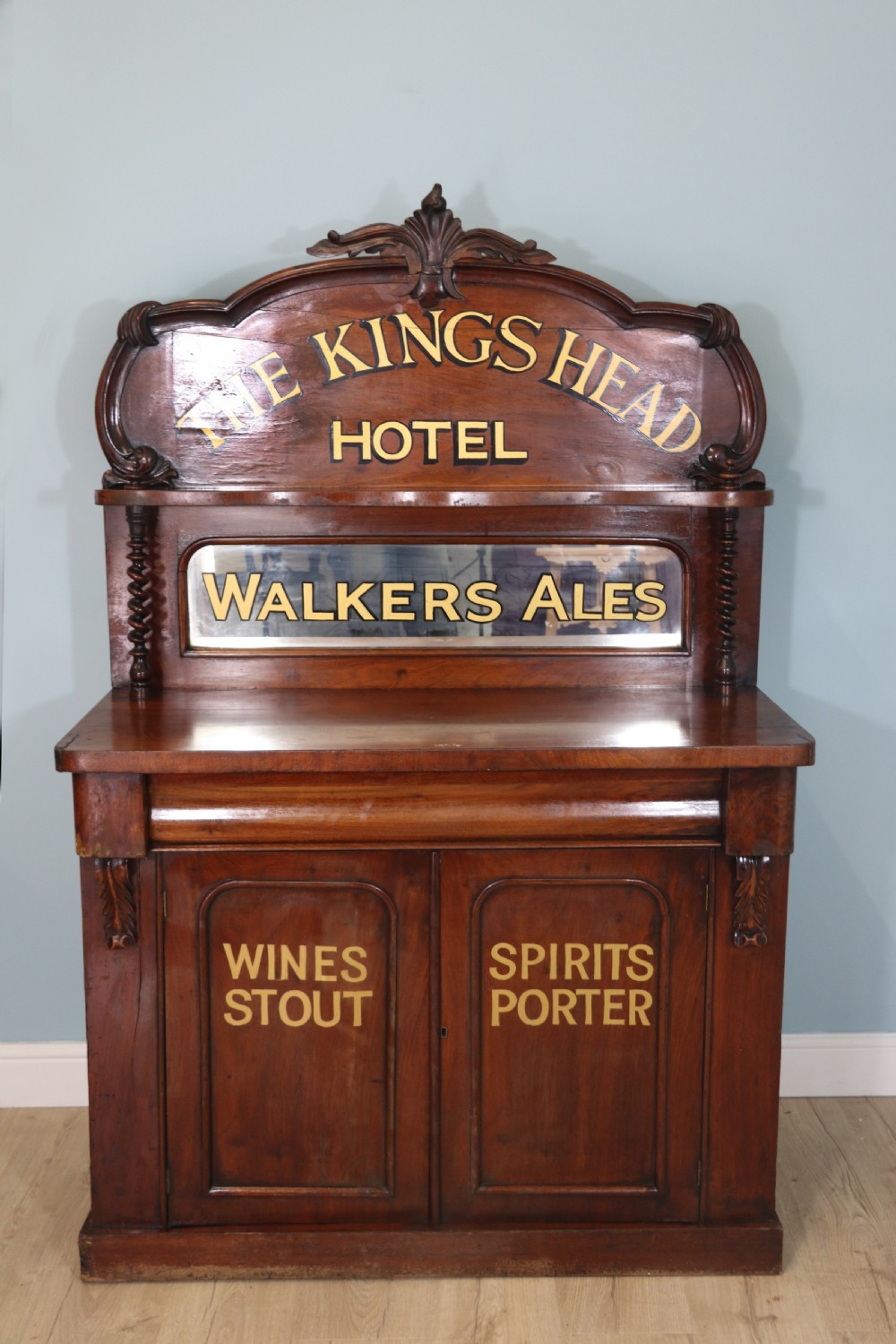 Victorian mirror back chiffonier with later sign written advertising detail 
