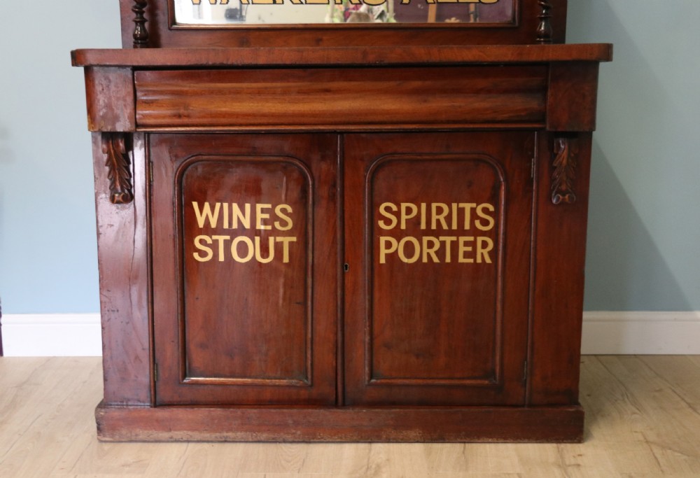 Victorian mirror back chiffonier with later sign written advertising detail  View V