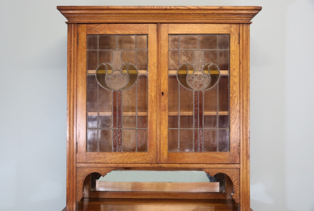 19th century light oak side cabinet in the Arts and Crafts style. View III