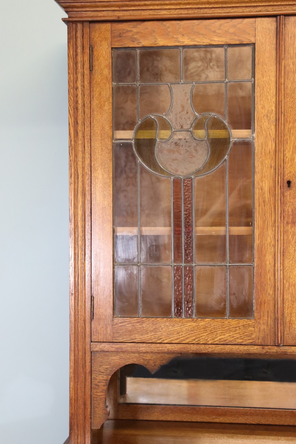 19th century light oak side cabinet in the Arts and Crafts style. View IX