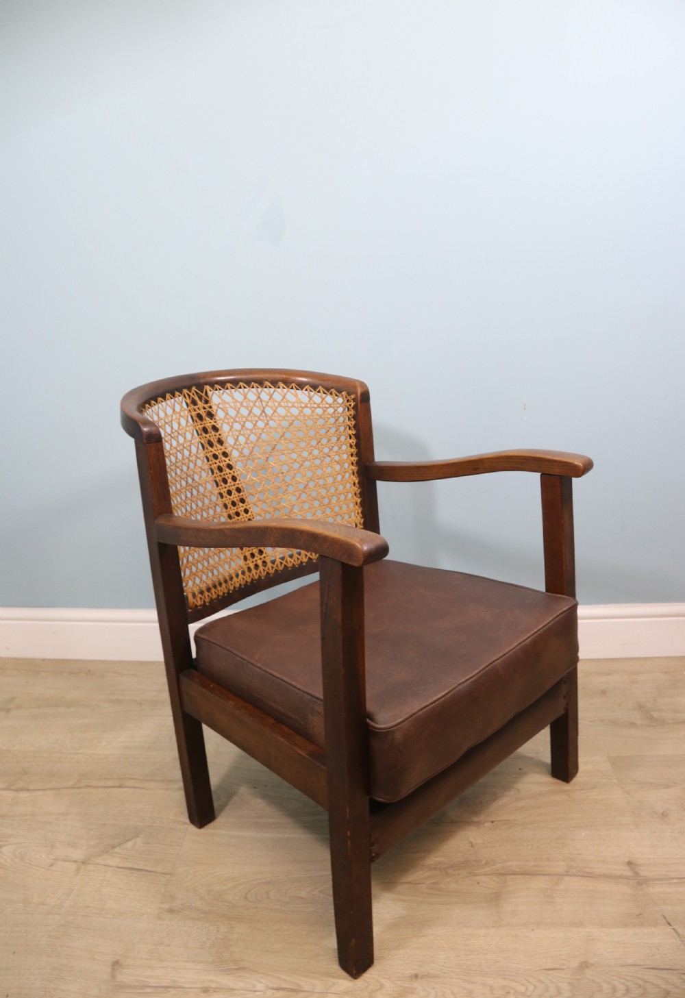 Early 20th century small beech framed cane back bergère chair. View V