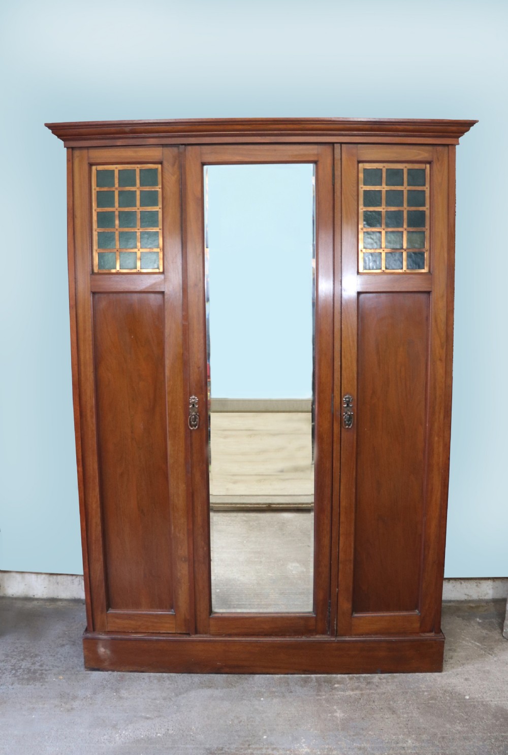 Arts and Crafts design mahogany & walnut wardrobe