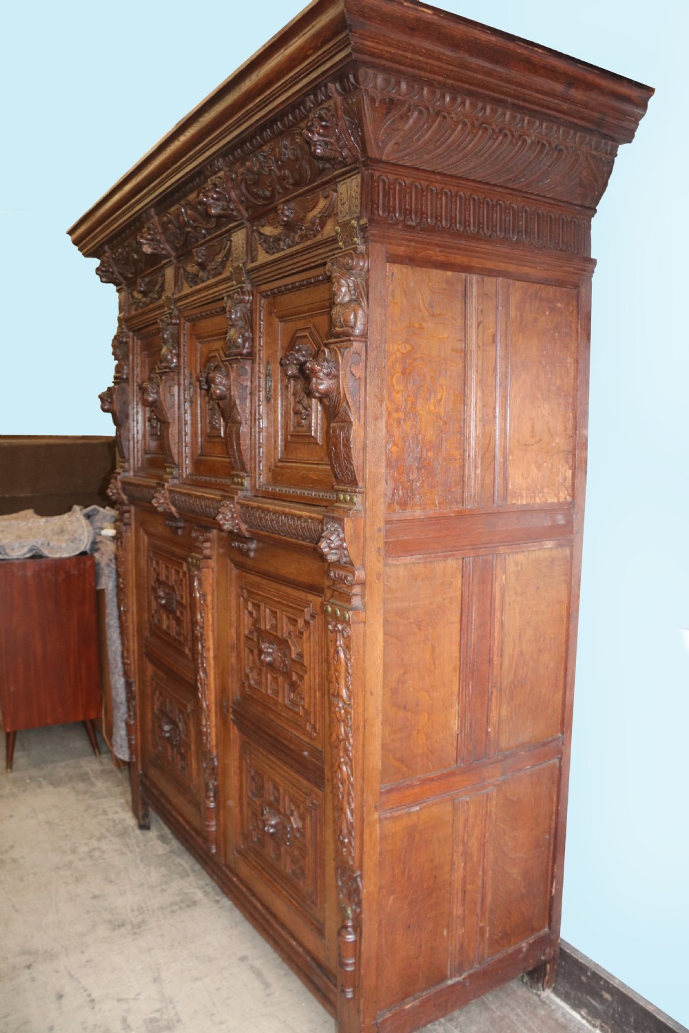 A totally magnificent 19th century oak court cupboard in the gothic style View III
