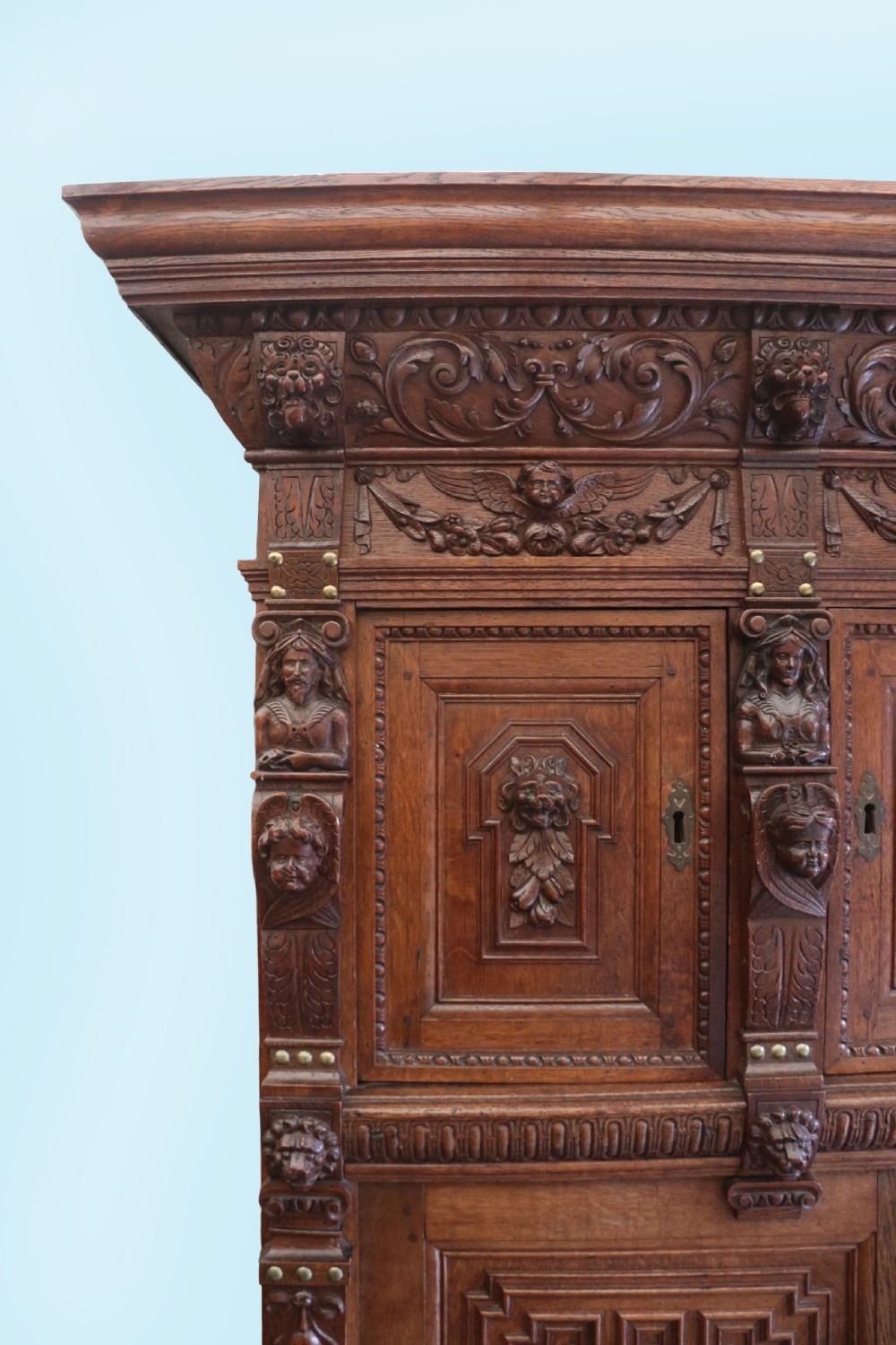 A totally magnificent 19th century oak court cupboard in the gothic style View V