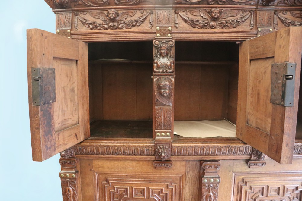 A totally magnificent 19th century oak court cupboard in the gothic style View VII