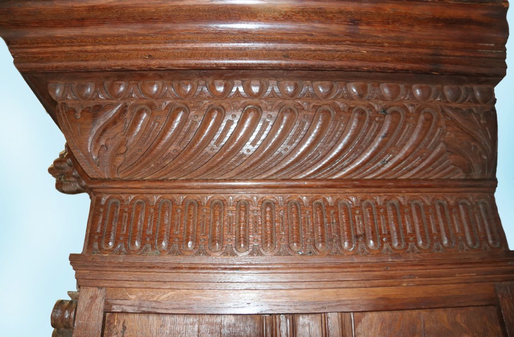 A totally magnificent 19th century oak court cupboard in the gothic style View VIII