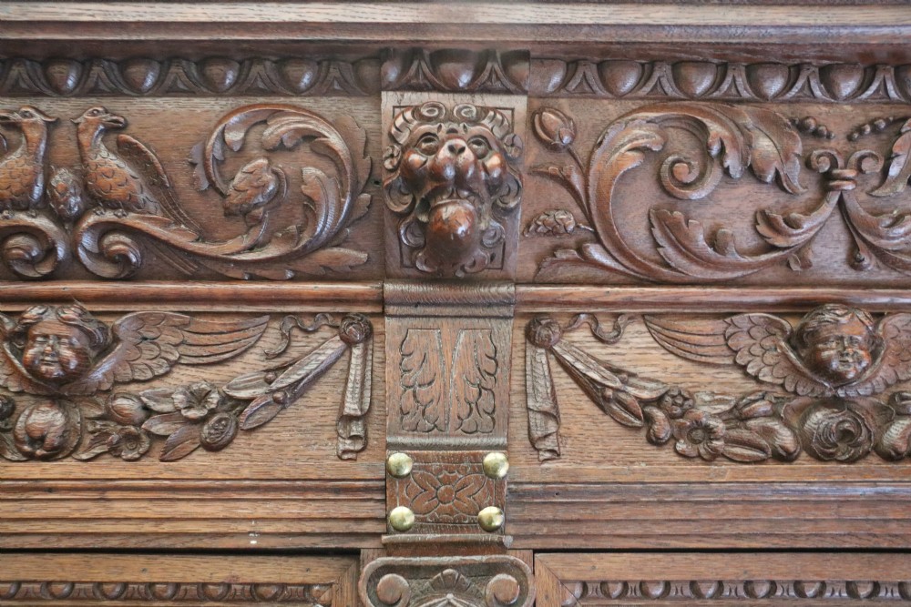 A totally magnificent 19th century oak court cupboard in the gothic style View IX