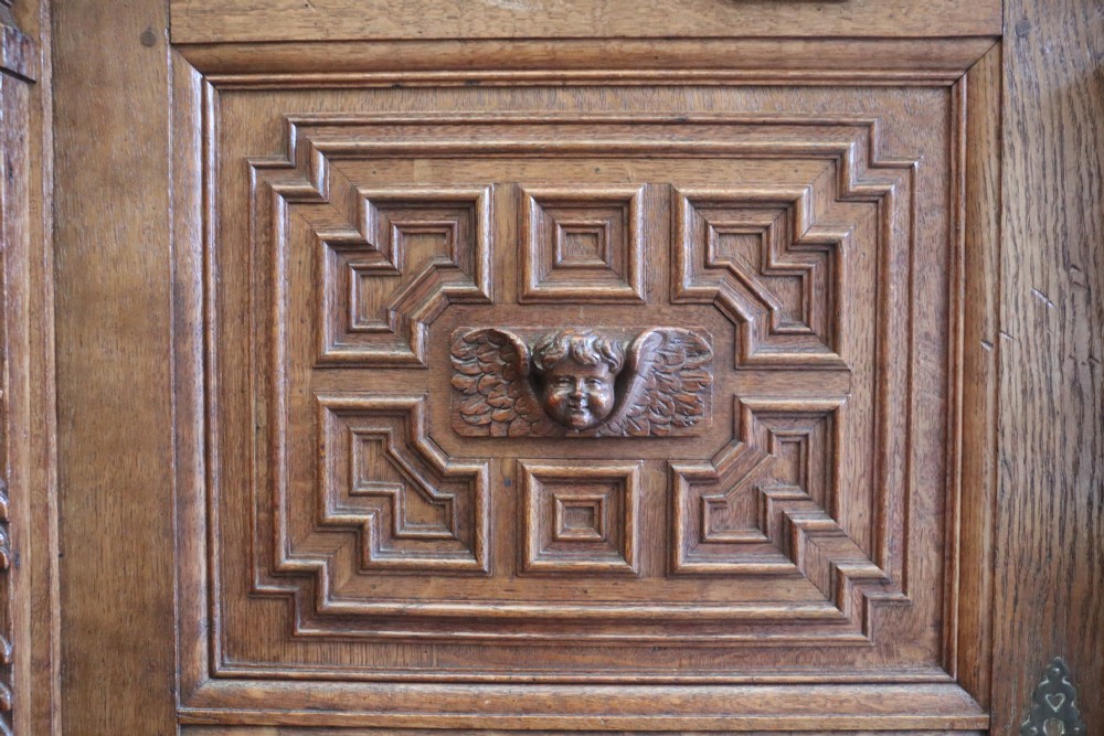 A totally magnificent 19th century oak court cupboard in the gothic style View XI