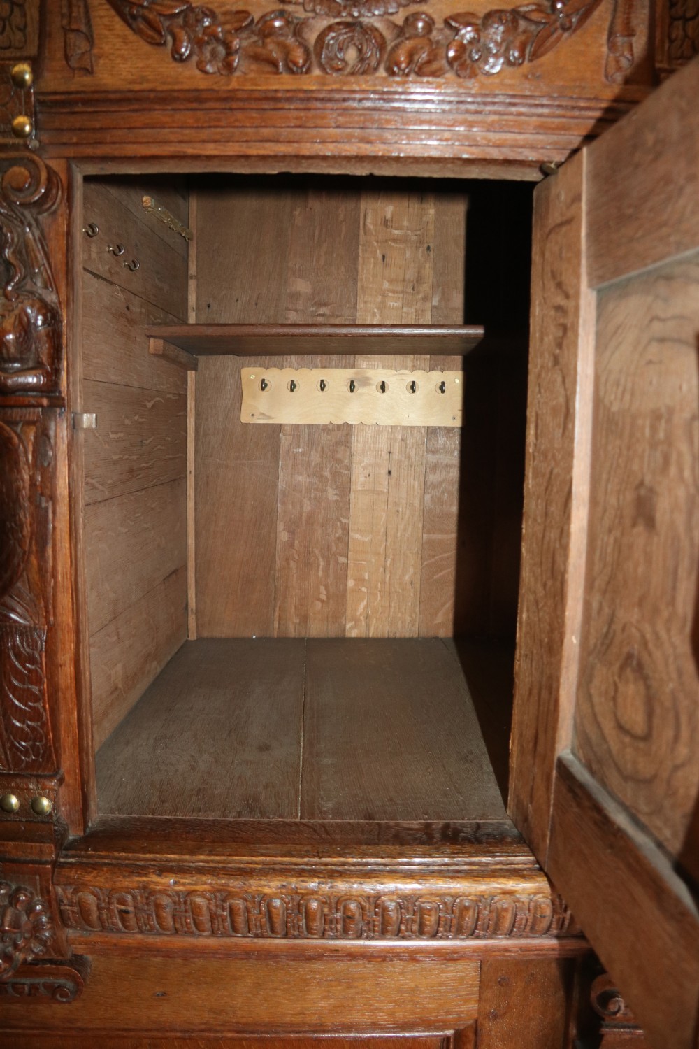A totally magnificent 19th century oak court cupboard in the gothic style View XIII