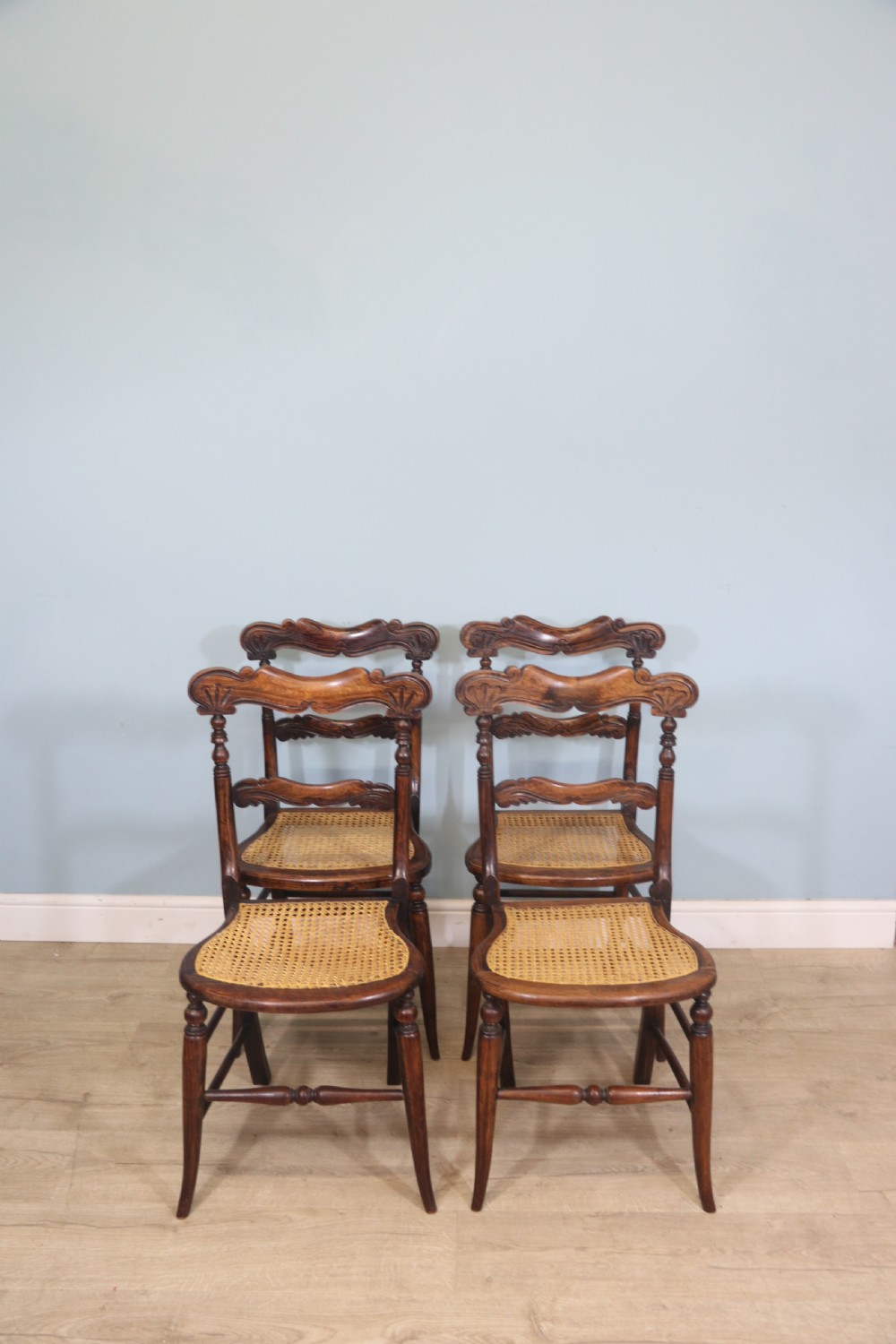  A lovely set of four Victorian hand finished simulated rosewood bar back cane seated chairs View II
