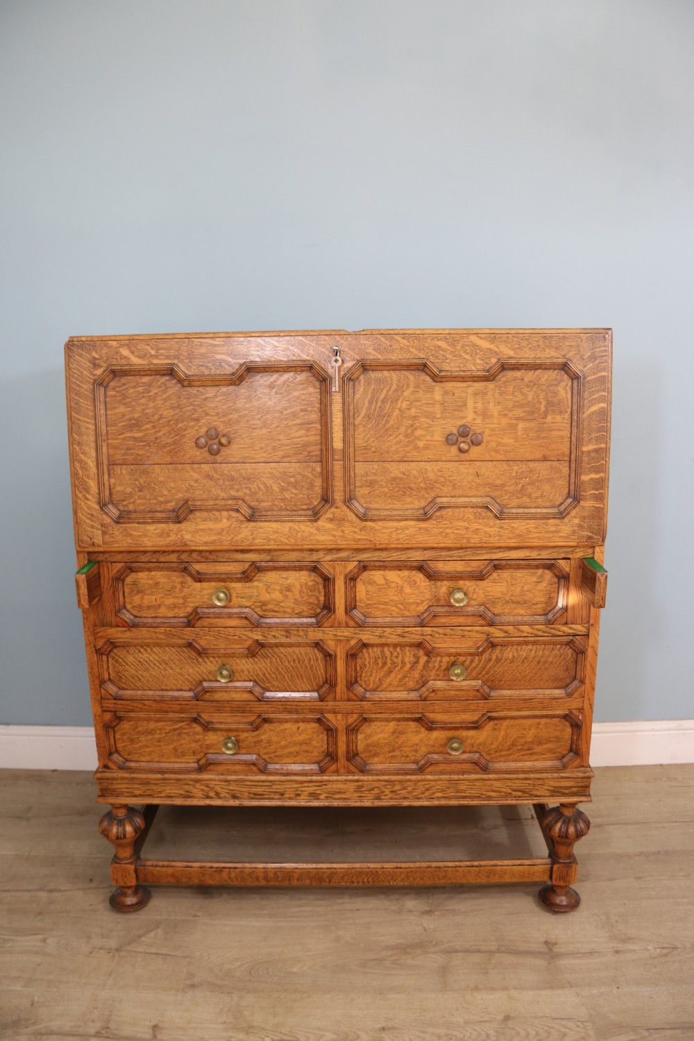 This fine Jacobean revival solid light oak bureau View III
