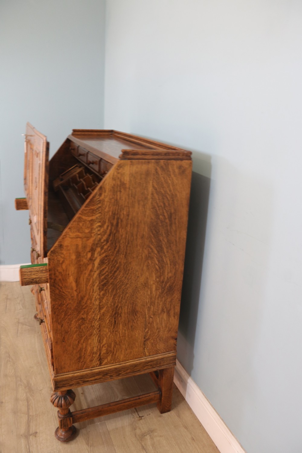 This fine Jacobean revival solid light oak bureau View IV