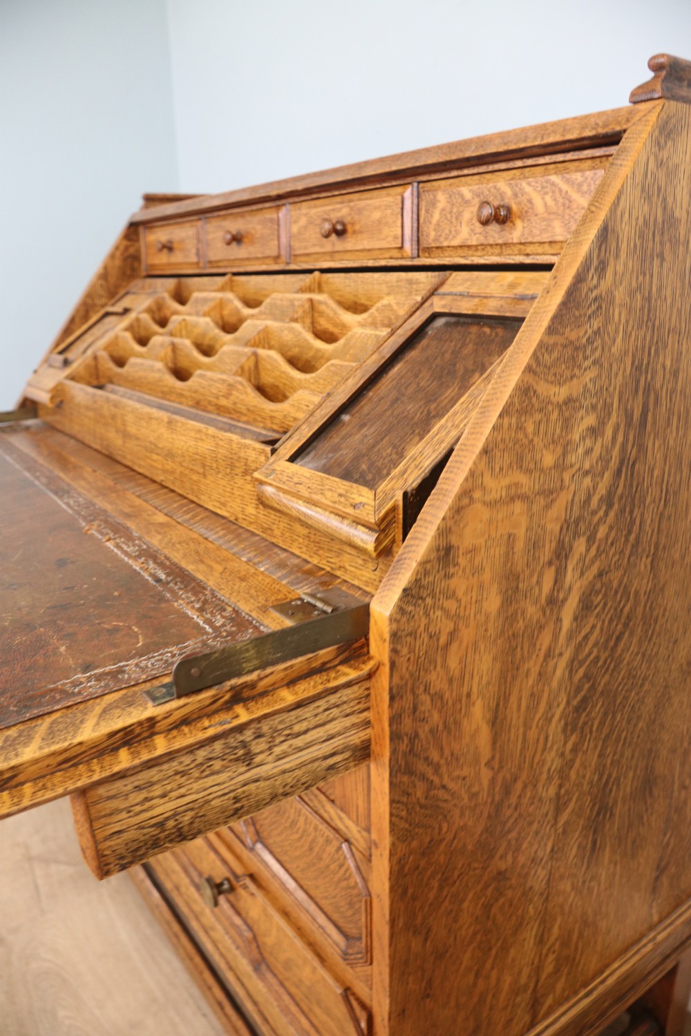 This fine Jacobean revival solid light oak bureau View VII