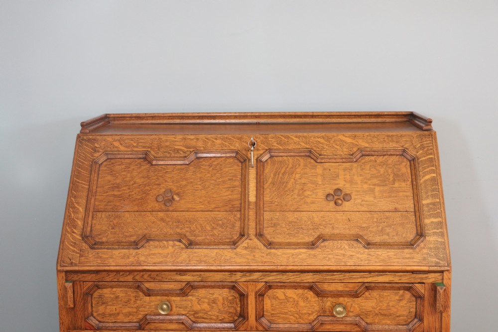 This fine Jacobean revival solid light oak bureau View VIII
