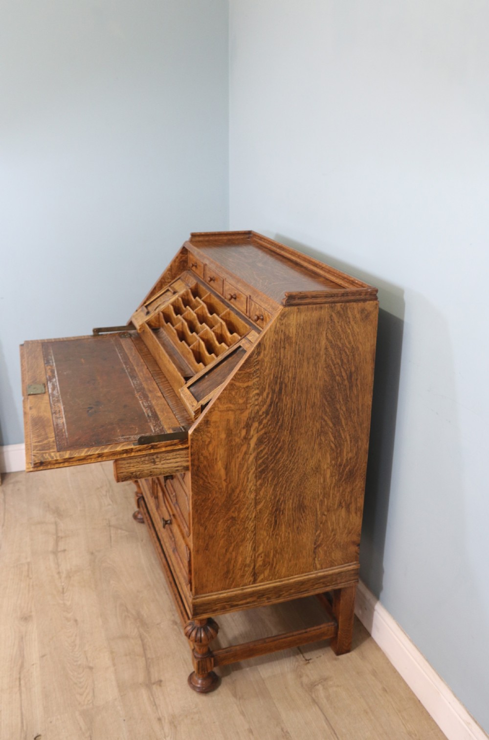 This fine Jacobean revival solid light oak bureau View X