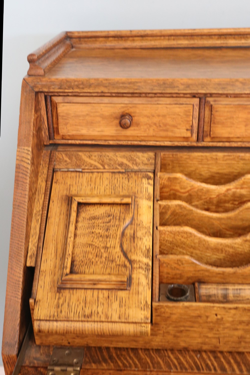 This fine Jacobean revival solid light oak bureau View XI