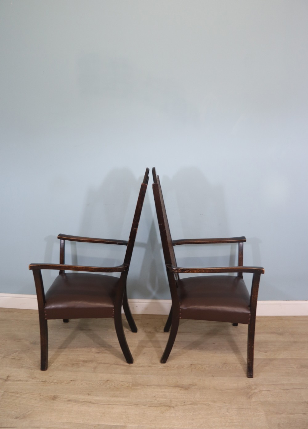 A lovely pair of early 20th century industrial looking cane shield back armchairs View IV