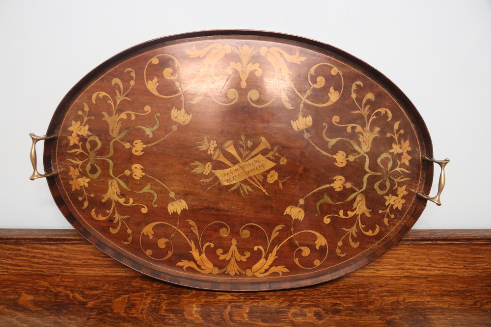 A lovely Edwardian mahogany and inlaid oval galleried tea tray View II