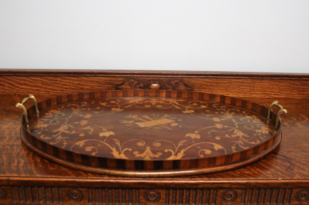 A lovely Edwardian mahogany and inlaid oval galleried tea tray View III