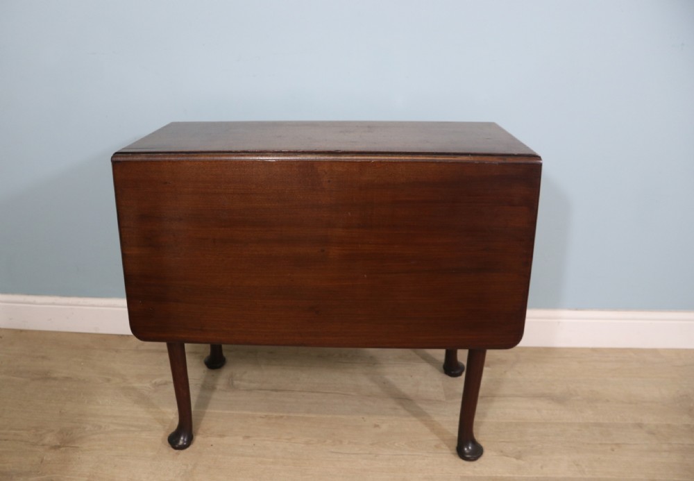 Lovely dropleaf table is made from solid mahogany View VI