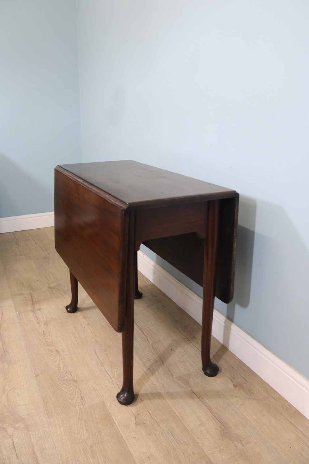 Lovely dropleaf table is made from solid mahogany View II