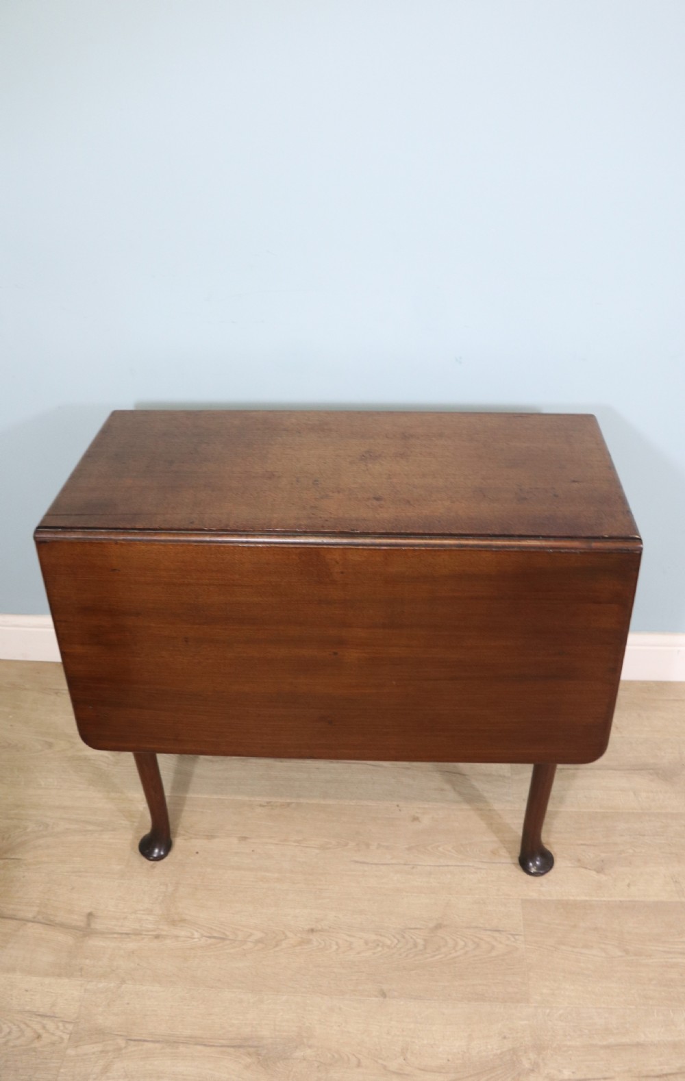 Lovely dropleaf table is made from solid mahogany View III
