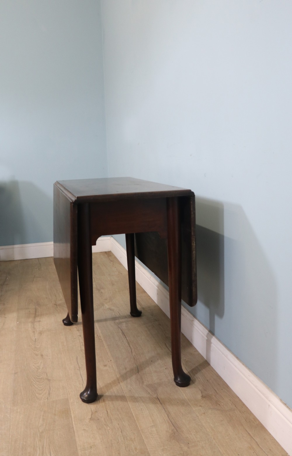 Lovely dropleaf table is made from solid mahogany View IV