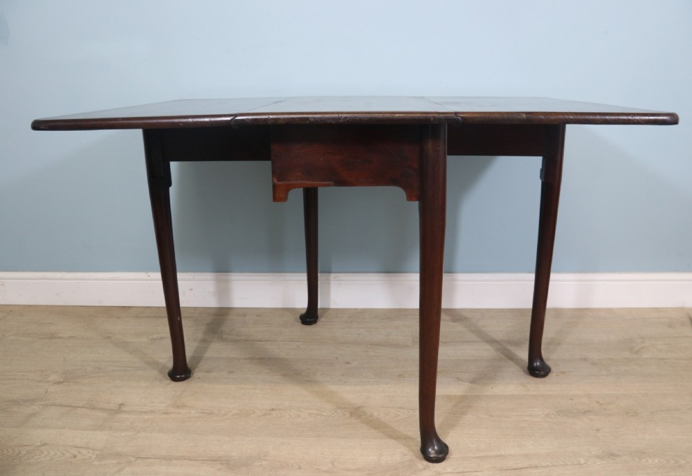 Lovely dropleaf table is made from solid mahogany