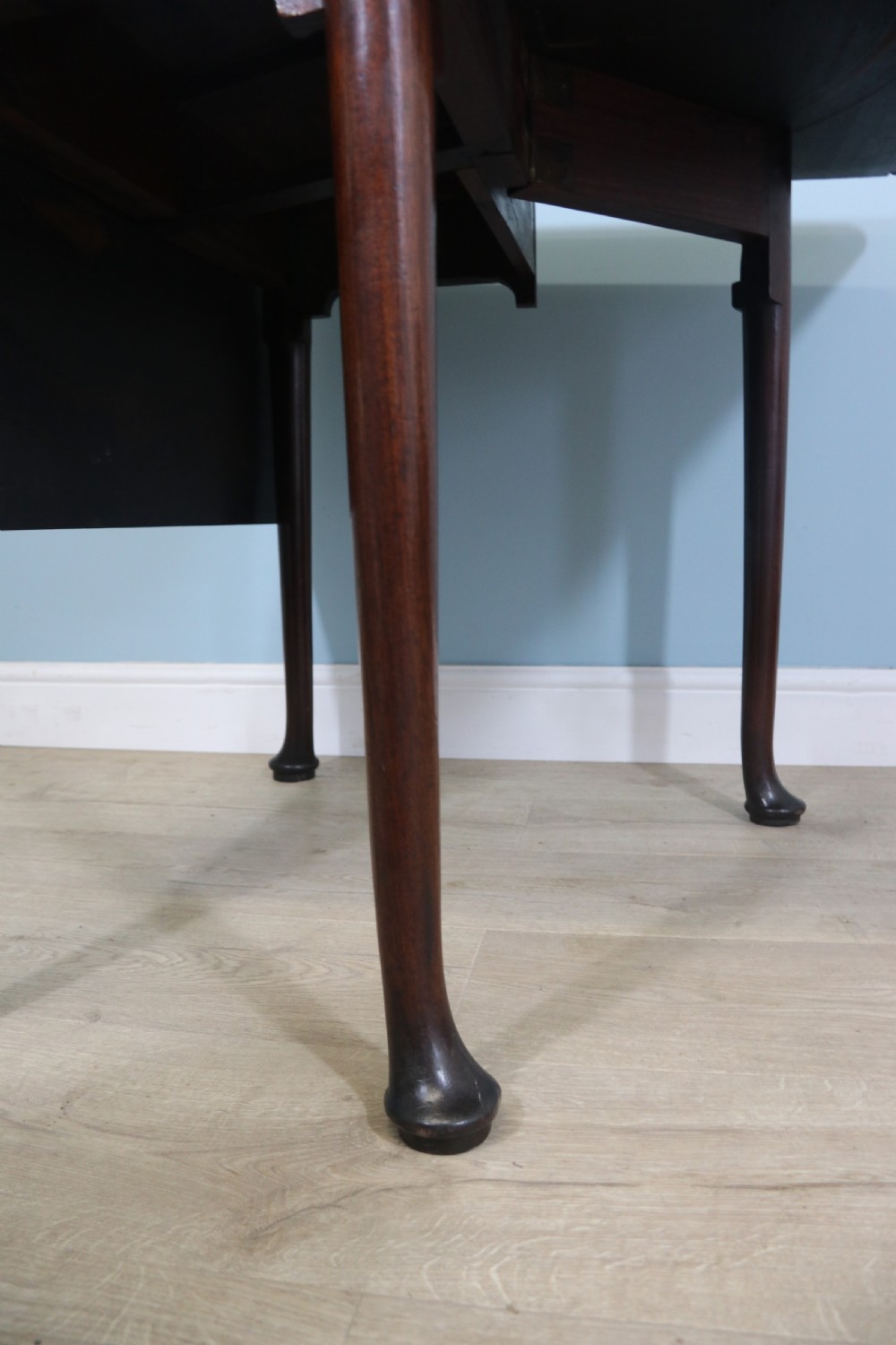Lovely dropleaf table is made from solid mahogany View IX