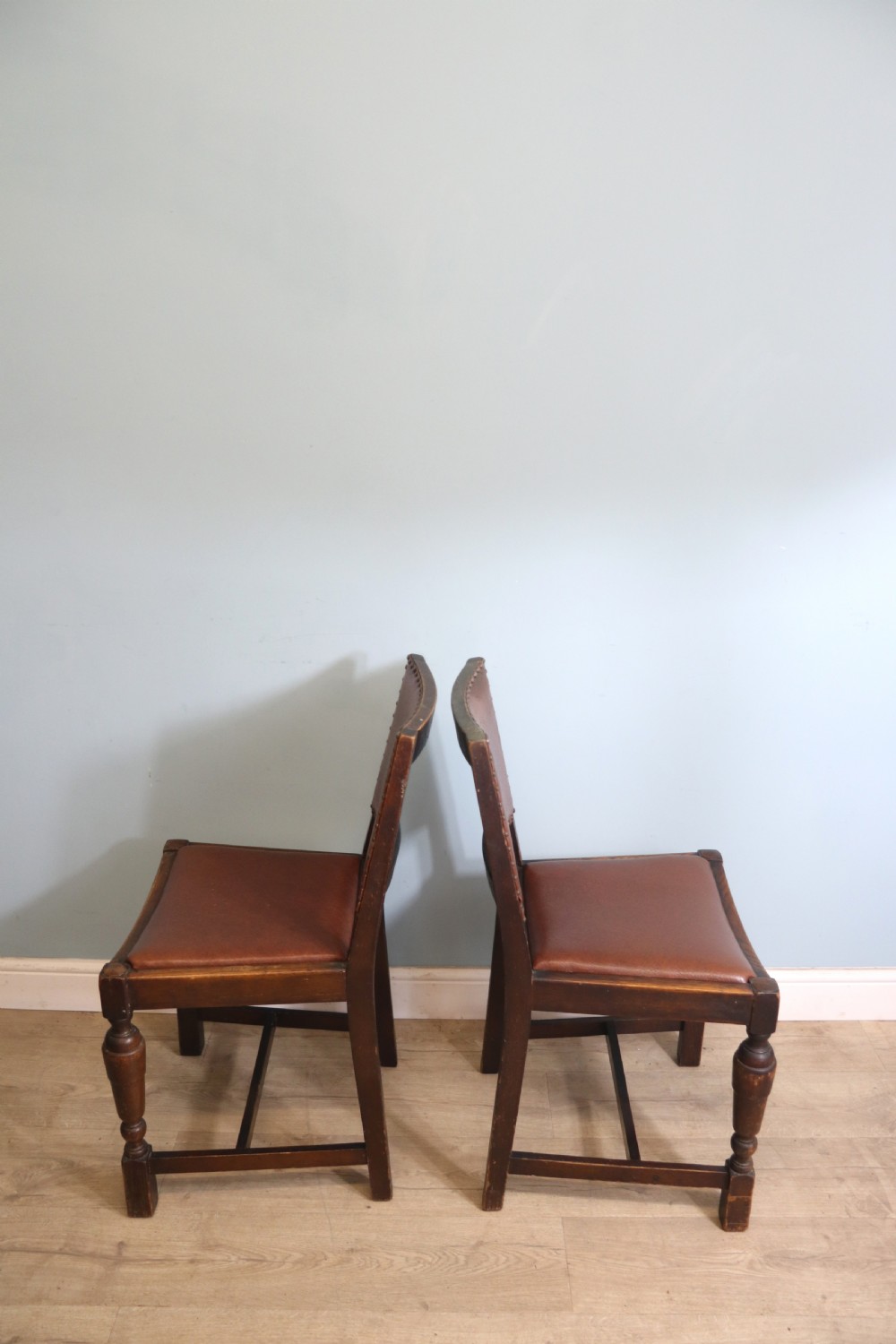 A set of four oak framed dining chairs dating from the 1930s View IV