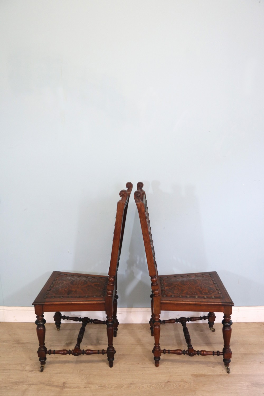 A lovely pair of Victorian oak framed dining or side chairs.  View IV
