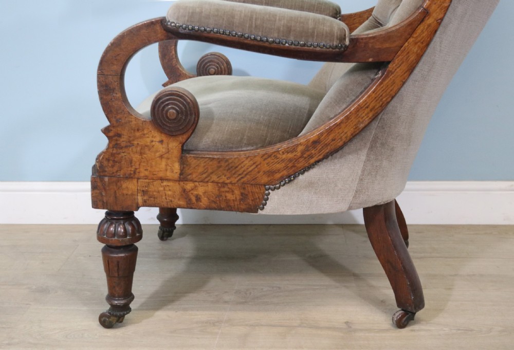 A six-piece late 19th-century chair suite featuring two button-back upholstered armchairs and four matching side chairs upholstered in taupe velvet with turned wooden front legs on castors. View XVIII