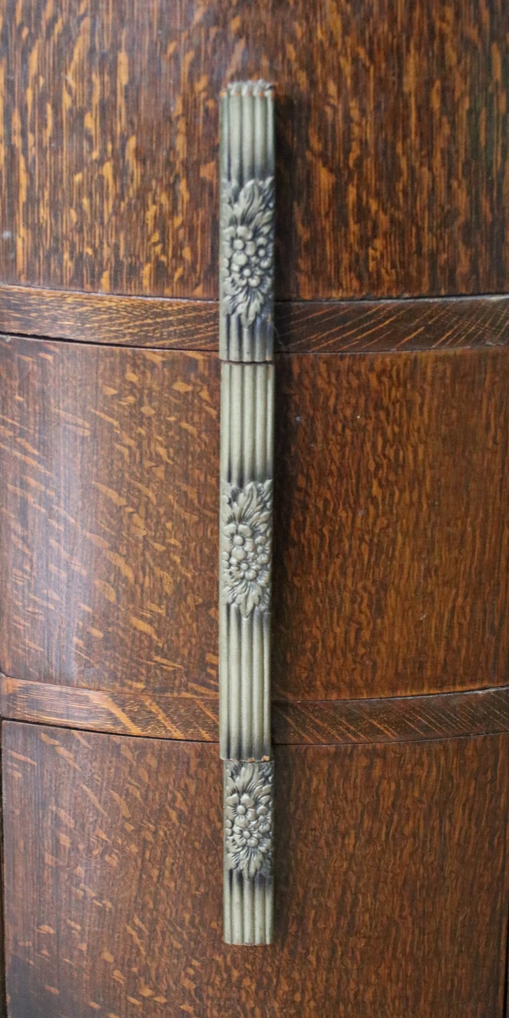 An Art Deco dark oak twin pedestal dressing chest featuring a central full-length arched mirror flanked by two curved three-drawer pedestals with metal gallery rails. View XI