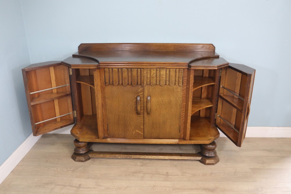 An imposing oak combination drinks cabinet and sideboard View III
