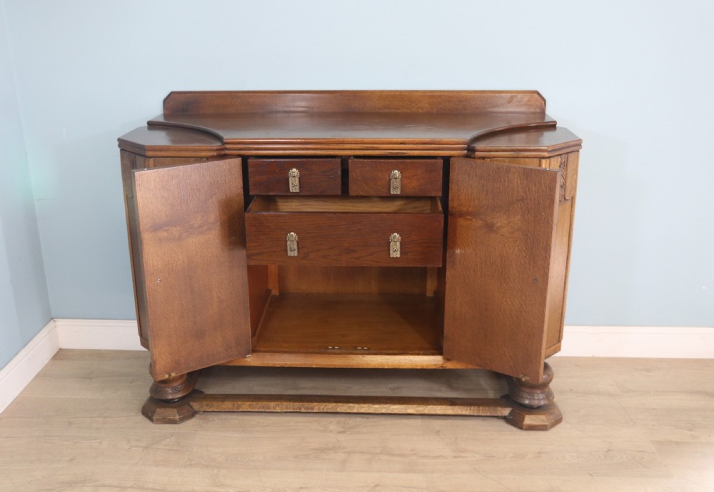 An imposing oak combination drinks cabinet and sideboard View V