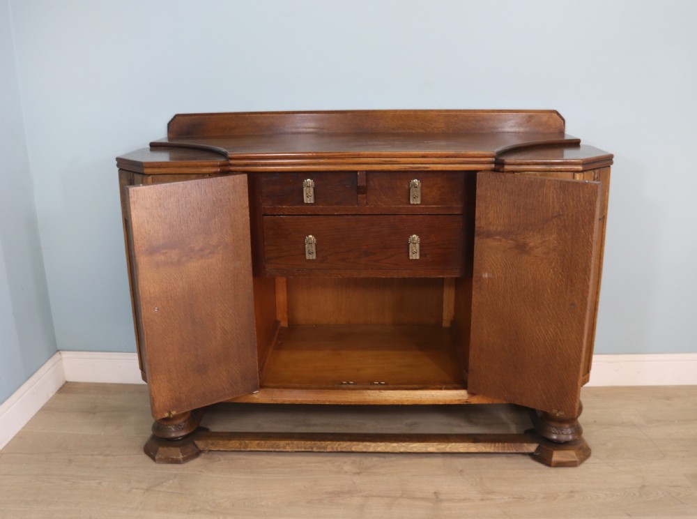 An imposing oak combination drinks cabinet and sideboard View VI