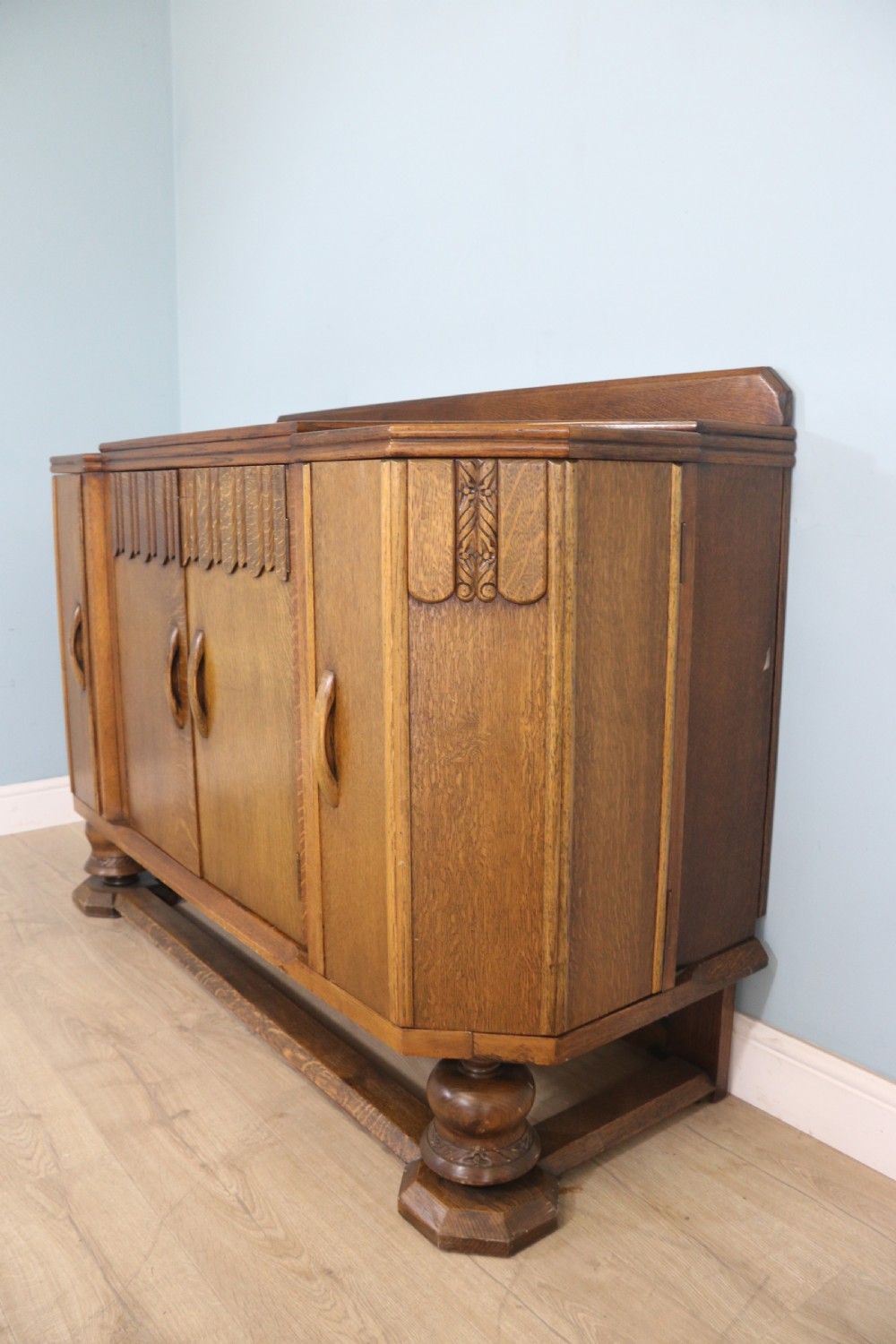An imposing oak combination drinks cabinet and sideboard View VII