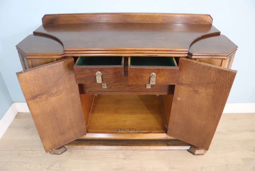An imposing oak combination drinks cabinet and sideboard View VIII