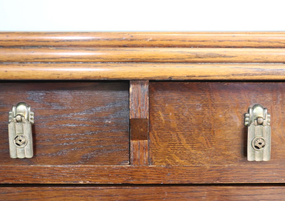 An imposing oak combination drinks cabinet and sideboard View XIV