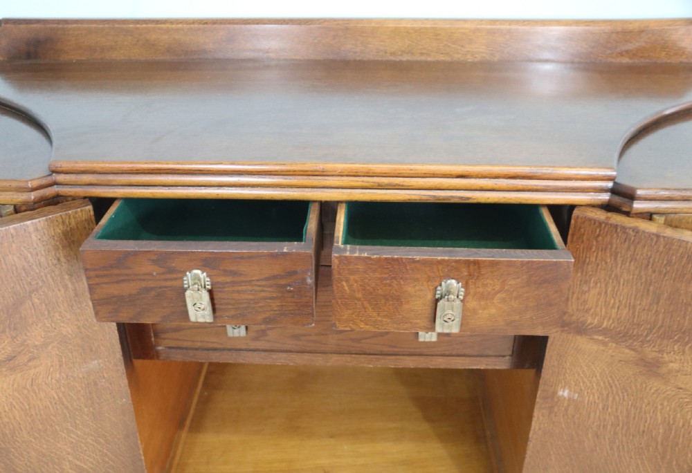 An imposing oak combination drinks cabinet and sideboard View XXIII