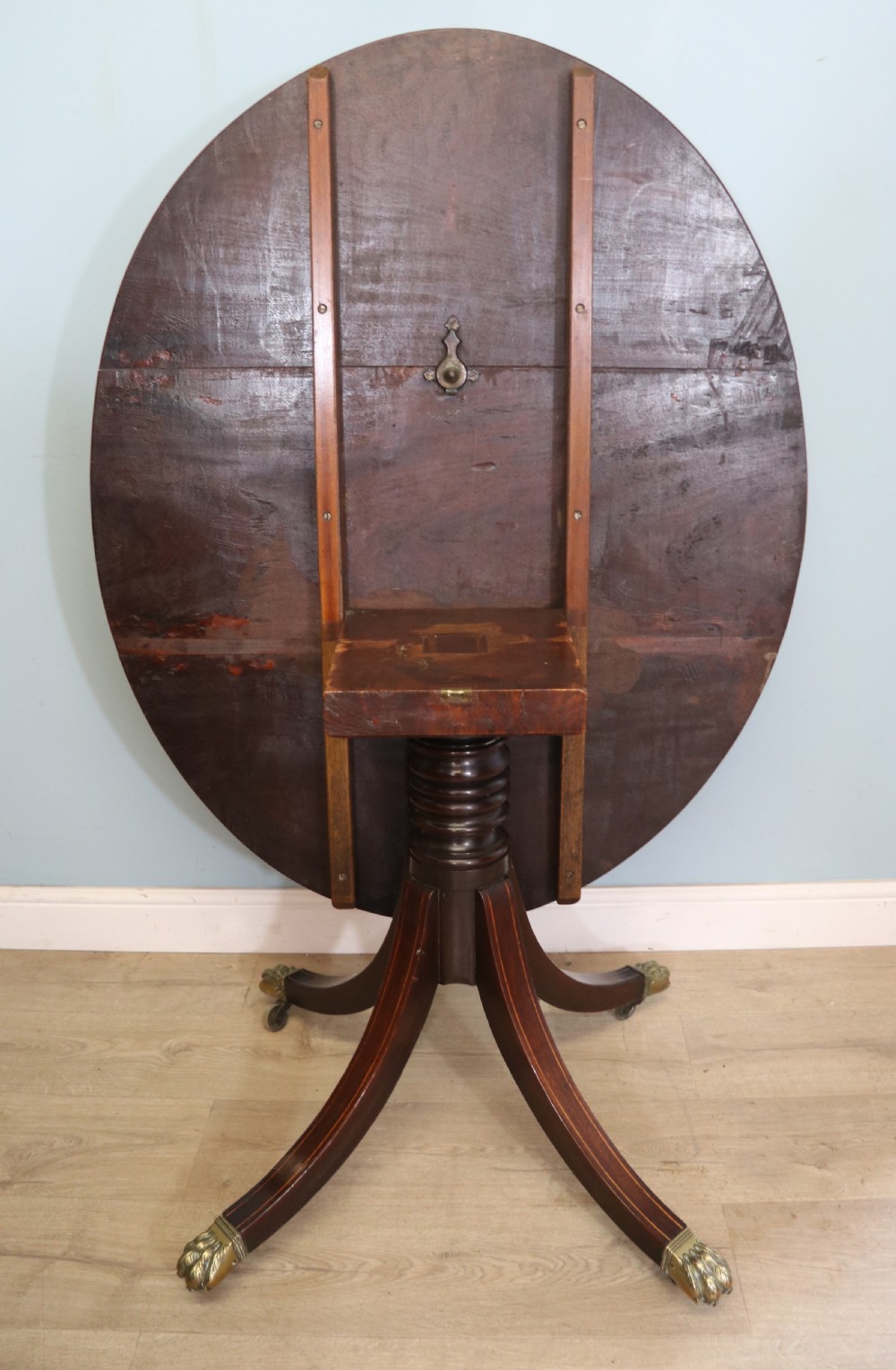 A fine English Antique! A lovely 19th century mahogany oval dining table.  View IX