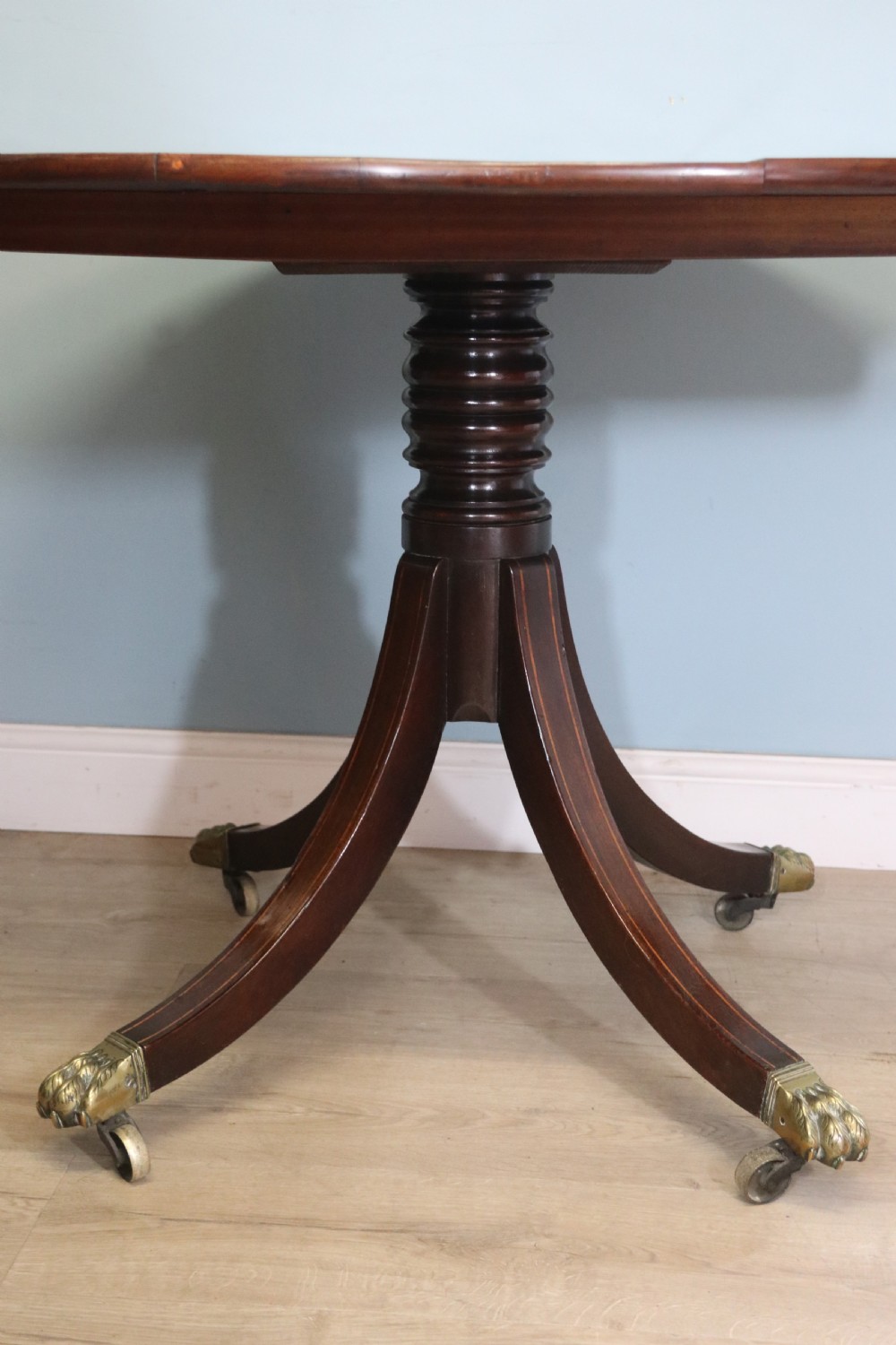 A fine English Antique! A lovely 19th century mahogany oval dining table.  View XV