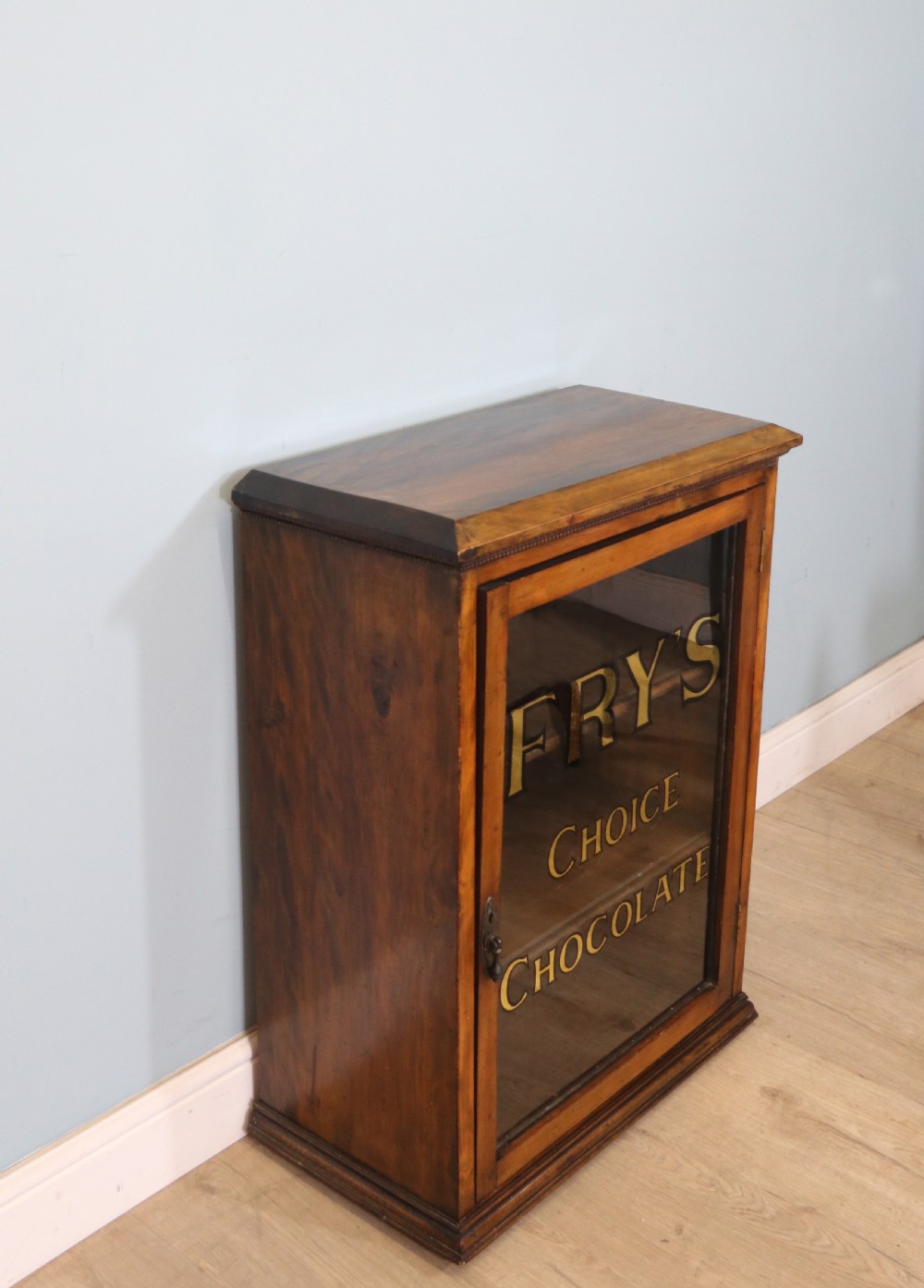 Edwardian hardwood single door display cabinet with 24ct Gold Leaf for Fry’s Choice Chocolate. View III