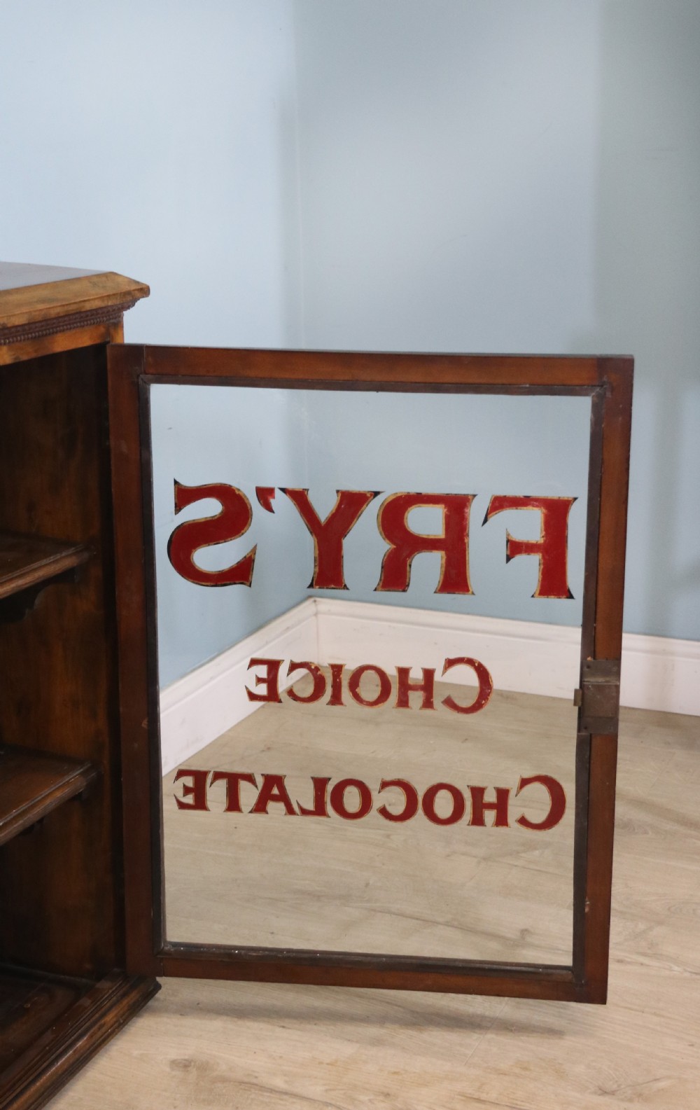 Edwardian hardwood single door display cabinet with 24ct Gold Leaf for Fry’s Choice Chocolate. View IX