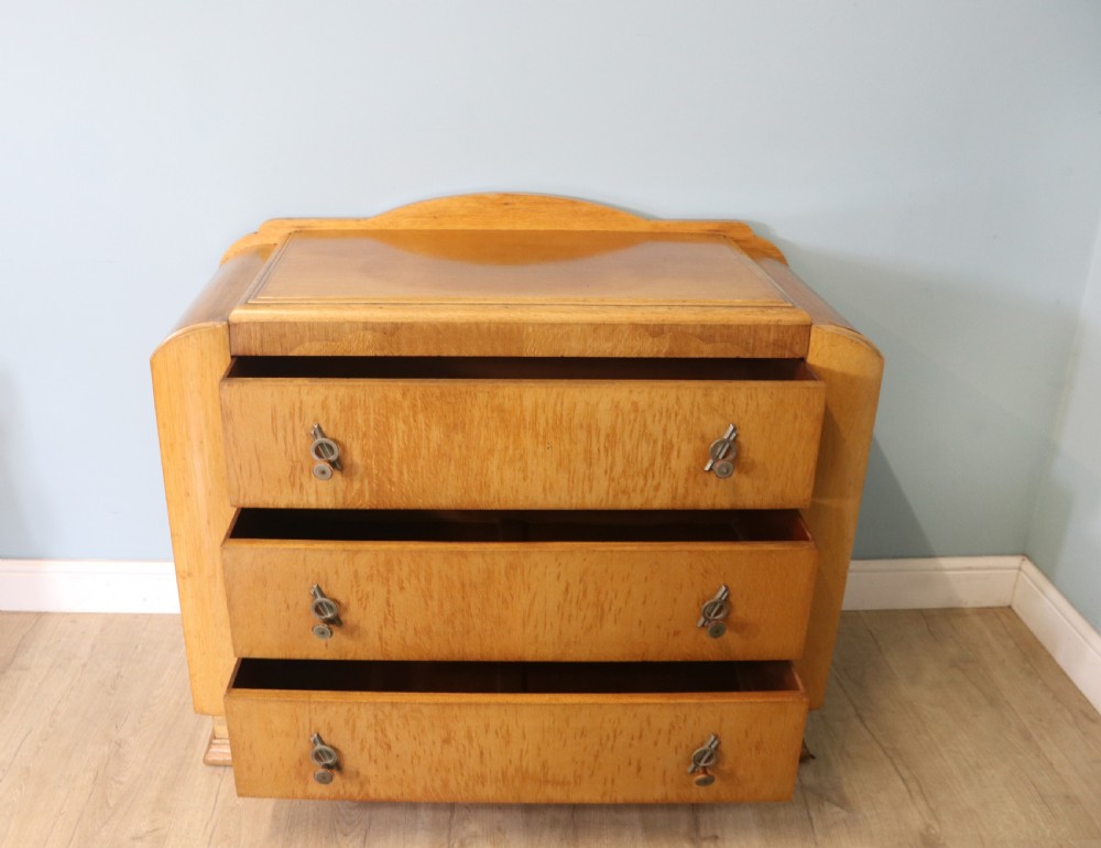  A lovely Art Deco period oak veneered chest of drawers. View III