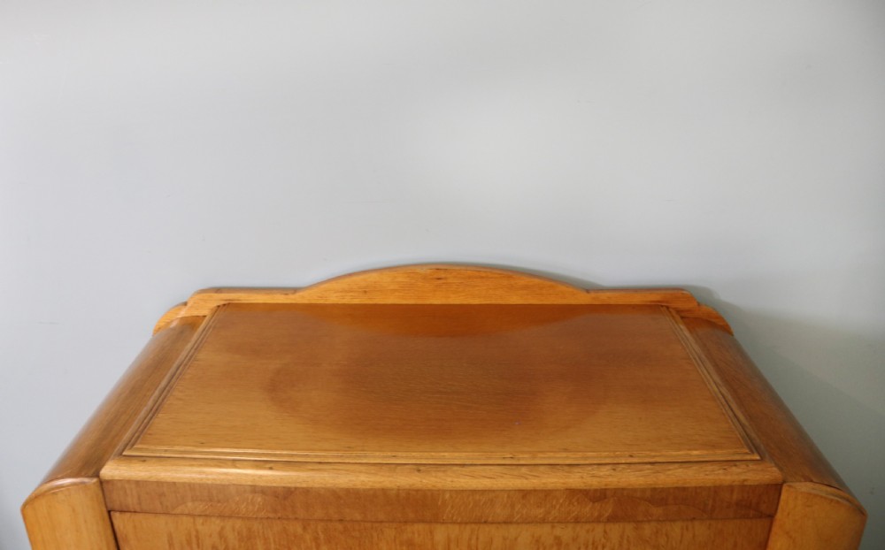  A lovely Art Deco period oak veneered chest of drawers. View VII