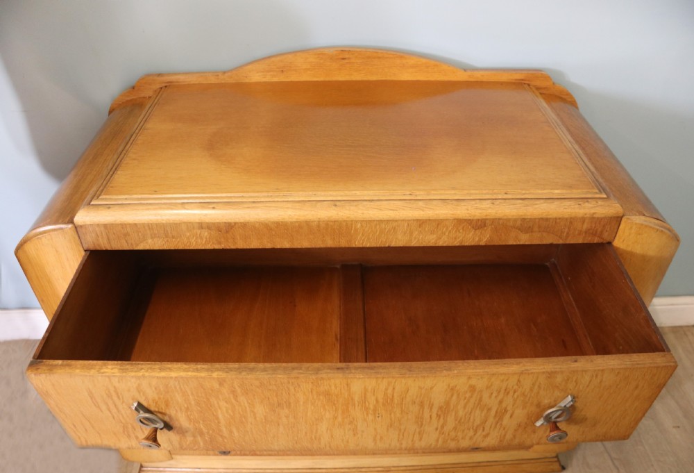  A lovely Art Deco period oak veneered chest of drawers. View VIII