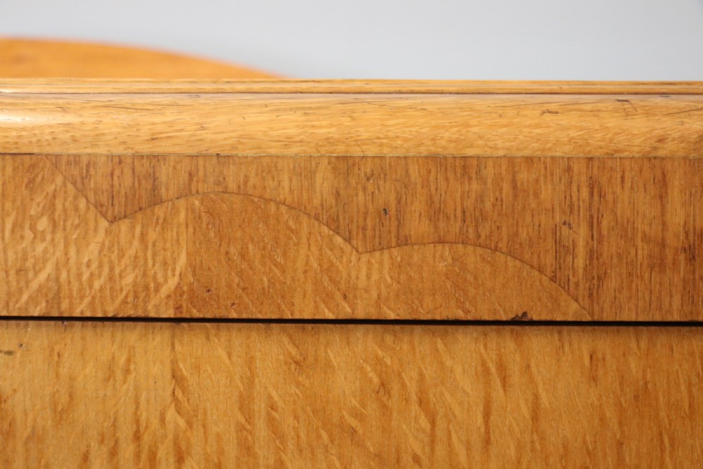  A lovely Art Deco period oak veneered chest of drawers. View XIV
