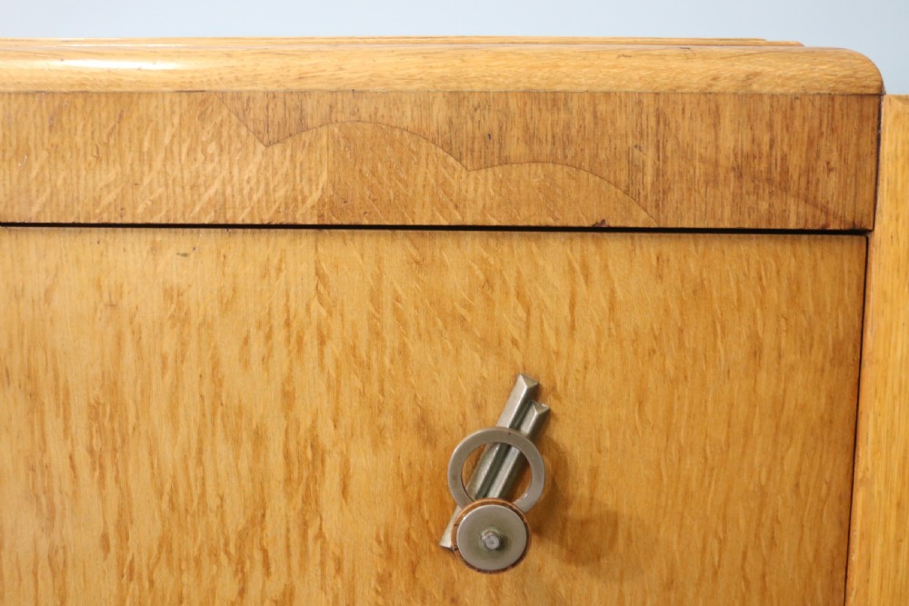  A lovely Art Deco period oak veneered chest of drawers. View XV