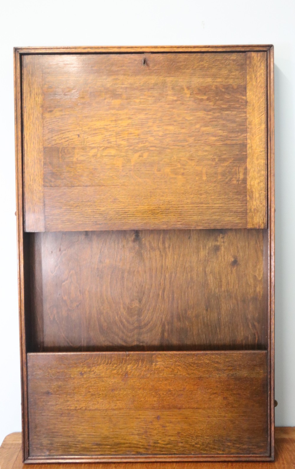 This early 20th century wall mounted oak combination desk and letter rack View V